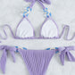 Solider Neckholder-Strandbikini mit seitlicher Krawatte und Schmuck