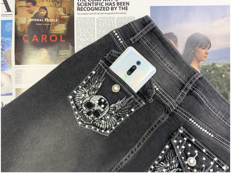 New Retro Embroidered Skull Hot Rhinestone Elastic Slim Fit Slimming Skinny Denim Trousers