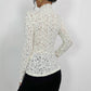 Maglietta aderente in pizzo con collo alto e orecchie in legno da donna