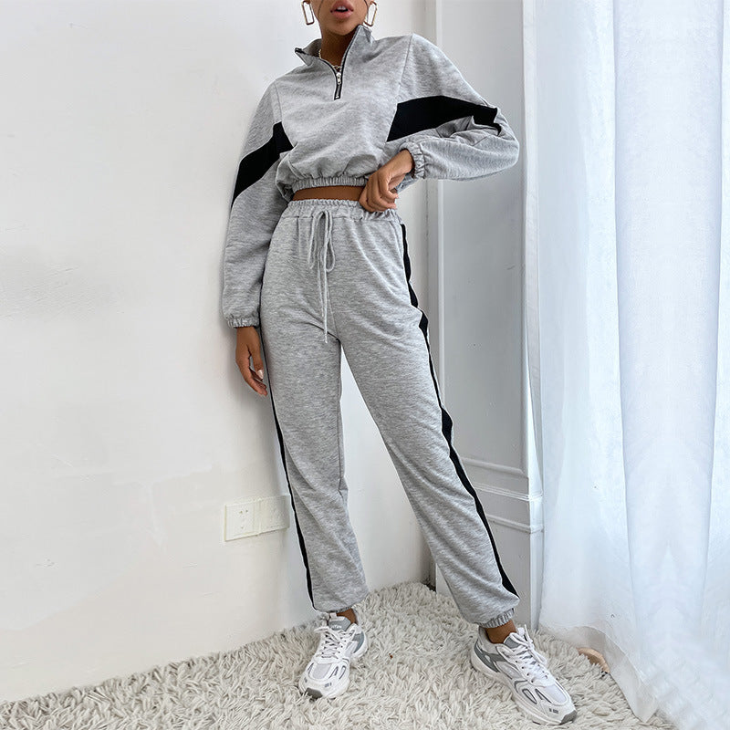 Completo sportivo da donna con colletto alto e felpa con colori a contrasto, due pezzi