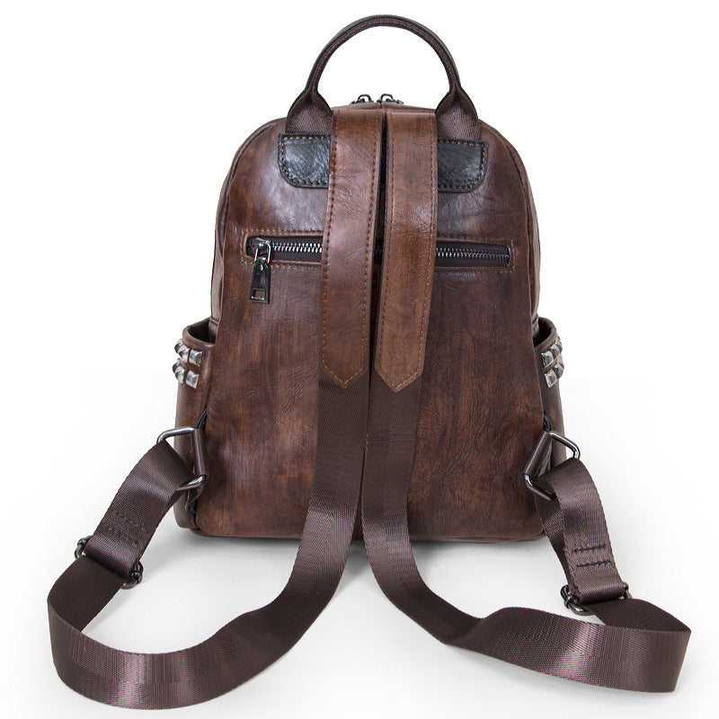 Zaino da viaggio casual con rivetti in pelle di grande capacità fatto a mano Tide