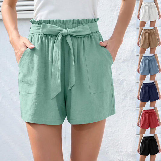 Pantaloncini da spiaggia estivi con tasche, con fiocco e volant alla moda, da donna