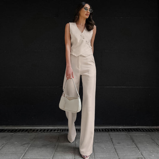 Completo da donna elegante alla moda in cotone e lino con pantaloni dritti a vita alta