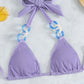 Solider Neckholder-Strandbikini mit seitlicher Krawatte und Schmuck