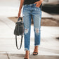 Zerrissene, nicht elastische Retro-Modejeans für Damen