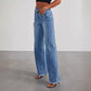 Jeans larghi da donna con cuciture laterali, orlo sfilacciato e gamba larga